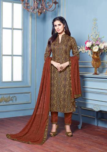 Grab This Beautiful Straight Suit In Multi Colored Top Paired With Brown Colored Bottom And Dupatta. Its Top And Bottom Are Fabricated On Cotton Satin Paired With Chiffon Dupatta. It Is Beautified With Intricate Prints And Resham Embroidery On Dupatta. Buy Now.