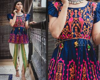 You Will Definitely Earn Lots Of Compliments Wearing This Designer Pair Of Kedias For Women. This Attractive And Unique Pattern Will Give You A Look Like Never Before. Its Top IS In Royal Blue Color Paired With Off-White Colored Bottom. It Is Khadi Based Fabricated Beautified with Thread Work And Lace Border.