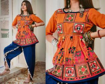 Kedias Are Not Only Meant For Boys, This Festive Season Grab This Beautiful And Attractive Set  Of Kedias With This Orange Colored Top Paired With Blue Colored Bottom. Its Top And Bottom Are Khadi Based Fabric Beautiifed With Multi Colored Thread Work And Lace Border.