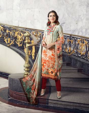 Go Colorful With This Semi-Stitched Straight Suit In Multi Colored Top And Dupatta Paired With Maroon Colored Bottom. Its Top Is Fabricated On Cotton Satin Paired With Santoon Bottom And Chiffon Dupatta. It Is Beautified With Prints And Thread Work. 