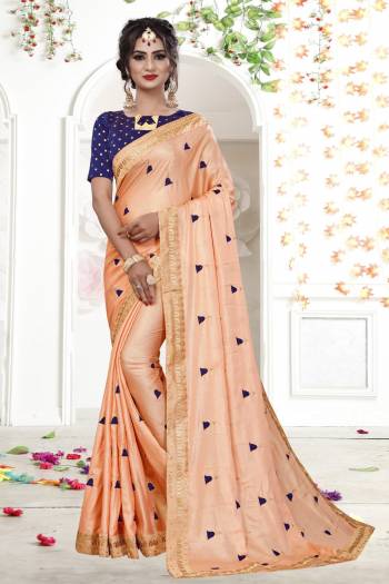 A Must Have Shade In Every Womens Wardrobe Is Here with this Designer Saree In Peach Color Paired With Contrasting Navy Blue Colored Blouse. This Saree Is Fabricated On Shimmer Georgette Paired With Brocade Fabricated Blouse. Both Its Fabrics Ensures Superb Comfort All Day Long.