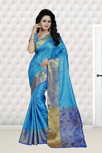 Look Pretty In This Silk Based Saree In Turquoise Blue Color Paired With Turquoise Blue Colored Blouse. This Saree And Blouse Are Fabricated On Banarasi Art Silk Beautified With Weave All Over. This Saree Is Light Weight And Easy To Carry All Day Long.