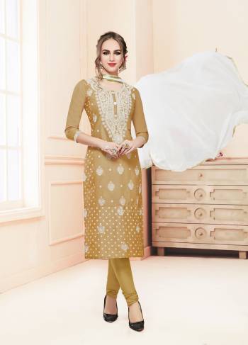 Here Is a Very Pretty Dress Material In Beige Colored top Paired With Beige Colored Bottom And Off-White Dupatta. Its Top And Bottom Are Cotton Based Paired with Chiffon Dupatta. Get This Stitched As Per Your Desired Fit And Comfort.