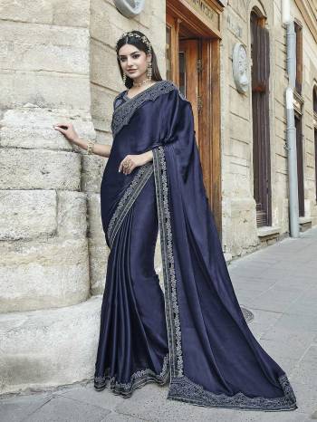 Enhance Your Personality Wearing This Designer Saree In Navy Blue Color Paired With Navy Blue Colored Blouse. This Saree Is Fabricated On Silk Chiffon Paired With Art Silk And Net Fabricated Blouse. Buy This Designer Saree Now.