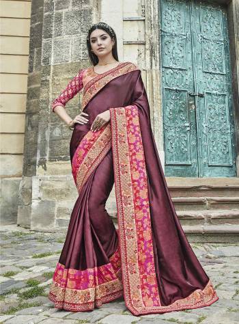 You Will Definitely Earn Lots Of Compliments Wearing This Designer Saree In Wine Color Paired With Contrasting Peach Colored Blouse. This Saree IS Fabricated On Silk Paired With Art Silk And Net Fabricated Blouse. Its Unique Color And Embroidery Will Earn You Lots Of Compliments.