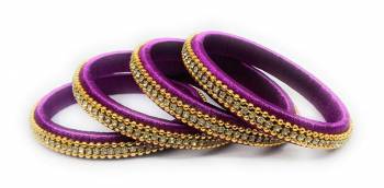 Grab This Beautiful Set Of Four Bangles To Simple Pair Up With Your Ethnic Wear Or You Can Also Mix It With Other Plain Bangles For More Heavy Look. It Is Made With Silk Thread And Beautified With Stone Work, Pair These Up With Same Or Any Contrasting Colored Ethnic Attire.