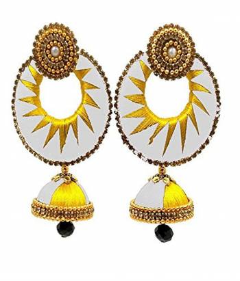 Enhance Your Traditional Look With This Lovely Set Of Earrings Pairing It With Same Or Contrasting Colored Traditional Attire. This Earring Set Is Made By Silk Thread Beautified With Stone Work. Buy This Lovely Pair Now.