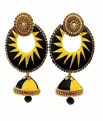 Enhance Your Traditional Look With This Lovely Set Of Earrings Pairing It With Same Or Contrasting Colored Traditional Attire. This Earring Set Is Made By Silk Thread Beautified With Stone Work. Buy This Lovely Pair Now.