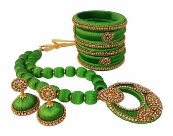 To Give A Heavy Ethnic Look To Your Personality, Grab This lovely Set Of Necklace Set With A Pair Of Matching Earrings And Set Of Bangles. This Set Is Made With Attractive Silk Thread Beautified With Stone Work. You Can Use It As Per Your Occasion With Matching Or Contrasting Colored Ethnic Attire. Buy Now.