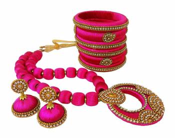 To Give A Heavy Ethnic Look To Your Personality, Grab This lovely Set Of Necklace Set With A Pair Of Matching Earrings And Set Of Bangles. This Set Is Made With Attractive Silk Thread Beautified With Stone Work. You Can Use It As Per Your Occasion With Matching Or Contrasting Colored Ethnic Attire. Buy Now.