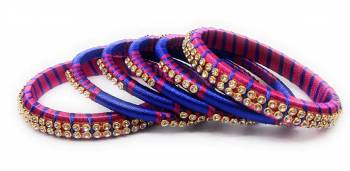 Grab This Beautiful Set Of Six Bangles To Simple Pair Up With Your Ethnic Wear Or You Can Also Mix It With Other Plain Bangles For More Heavy Look. It Is Made With Silk Thread And Beautified With Stone Work, Pair These Up With Same Or Any Contrasting Colored Ethnic Attire.