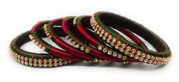 Grab This Beautiful Set Of Six Bangles To Simple Pair Up With Your Ethnic Wear Or You Can Also Mix It With Other Plain Bangles For More Heavy Look. It Is Made With Silk Thread And Beautified With Stone Work, Pair These Up With Same Or Any Contrasting Colored Ethnic Attire.