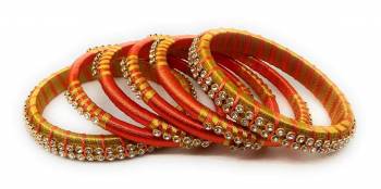 Grab This Beautiful Set Of Six Bangles To Simple Pair Up With Your Ethnic Wear Or You Can Also Mix It With Other Plain Bangles For More Heavy Look. It Is Made With Silk Thread And Beautified With Stone Work, Pair These Up With Same Or Any Contrasting Colored Ethnic Attire.