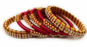 Grab This Beautiful Set Of Six Bangles To Simple Pair Up With Your Ethnic Wear Or You Can Also Mix It With Other Plain Bangles For More Heavy Look. It Is Made With Silk Thread And Beautified With Stone Work, Pair These Up With Same Or Any Contrasting Colored Ethnic Attire.