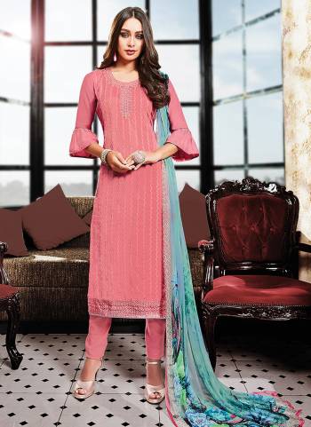 Look Pretty Wearing This Designer Suit In Pink Colored Top And Bottom Paired With Contrasting Light Blue Colored Dupatta. This Dress Material Is Satin Based Fabric Paired With Chiffon Dupatta. It Is Beautified with Prints And Resham Work. Buy Now.