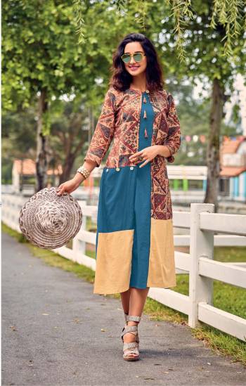 Add This Pretty Kurti To Your Wardrobe In Blue Color Fabricated On Cotton Satin. This Readymade Kurti Is Beautified With Prints And Available In All Regular Sizes. 