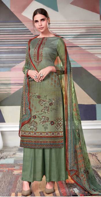 New Shade In Green To Add Into Your Wardrobe With This Dress Material In Olive Green Color.Its Top Is Crepe Georgette Fabricated Paired With Santoon Bottom And Chiffon Dupatta. Buy This Pretty Light Weight Suit Now.