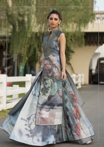 Add This Pretty Readymade Grey Colored Gown Fabricated On Art Silk Beautified With Digital Prints All Over It. This This Pretty Gown Is Easy To carry All Day Long. 