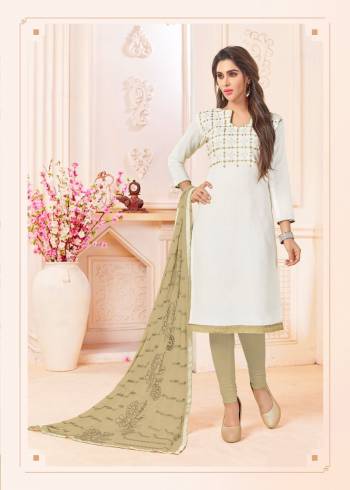 Simple And Elegant Looking Dress Material Is Here In White Color Paired With Beige Colored Bottom And Dupatta. Its Top IS Fabricated On Cotton Slub Paired With Cotton Bottom And Chiffon Dupatta. Buy Now.