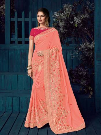 Drape this peach color silk saree. this gorgeous saree featuring a beautiful mix of designs. look gorgeous at an upcoming any occasion wearing the saree. Its attractive color and designer heavy embroidered design, Flower patch design, moti design, beautiful floral design work over the attire & contrast hemline adds to the look. Comes along with a contrast unstitched blouse.