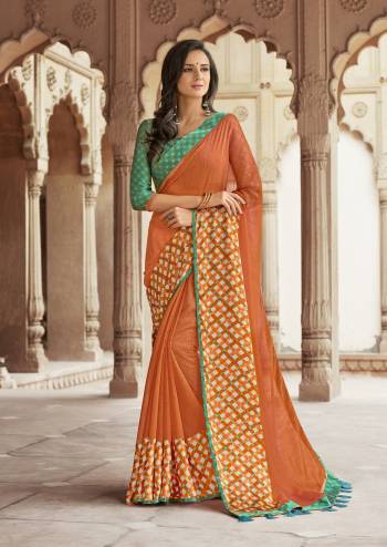 For A Traditional Look, Grab This Saree With Traditional Color Pallete In Orange Color Paired With Contrasting Green colored Blouse. This Saree Is Fabricated On Linen Paired With Satin Blouse. Buy Now.