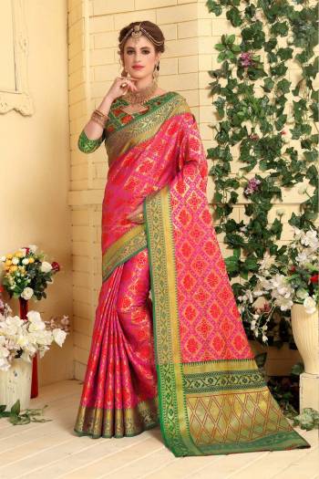 You Will Earn Lots Of Compliments Wearing This Silk Based Saree In Pink Color Paired With Contrasting Green Colored Blouse. This Saree Is Fabricated Jacquard Silk Paired With art Silk Blouse. Buy Now.