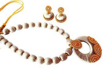 Give An Enhanced Look To Your Ethnic Attire Pairing It Up With This Attractive Necklace Set Made With Resham Threads And Beautified With Stone Work. This Pretty Set Can Be Paired With Same Or Contrasting Colored Attire. Buy This Now.