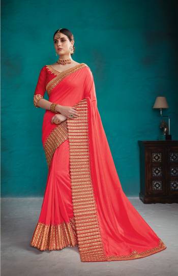 Adorn The Very Pretty Angelic Look Wearing This Designer Saree In Crimson Red Color Paired With Red Colored Blouse. This Saree And Blouse Are Fabricated On Art Silk Beautified With Heavy Embroidered Lace Border. 