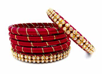 Grab This Beautiful Set Of Six Bangles To Simple Pair Up With Your Ethnic Wear Or You Can Also Mix It With Other Plain Bangles For More Heavy Look. It Is Made With Silk Thread And Beautified With Stone Work, Pair These Up With Same Or Any Contrasting Colored Ethnic Attire.