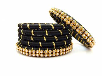 Grab This Beautiful Set Of Six Bangles To Simple Pair Up With Your Ethnic Wear Or You Can Also Mix It With Other Plain Bangles For More Heavy Look. It Is Made With Silk Thread And Beautified With Stone Work, Pair These Up With Same Or Any Contrasting Colored Ethnic Attire.