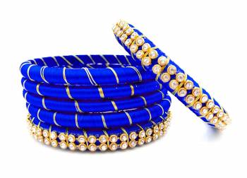 Grab This Beautiful Set Of Six Bangles To Simple Pair Up With Your Ethnic Wear Or You Can Also Mix It With Other Plain Bangles For More Heavy Look. It Is Made With Silk Thread And Beautified With Stone Work, Pair These Up With Same Or Any Contrasting Colored Ethnic Attire.