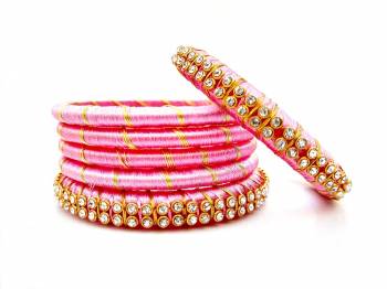 Grab This Beautiful Set Of Six Bangles To Simple Pair Up With Your Ethnic Wear Or You Can Also Mix It With Other Plain Bangles For More Heavy Look. It Is Made With Silk Thread And Beautified With Stone Work, Pair These Up With Same Or Any Contrasting Colored Ethnic Attire.