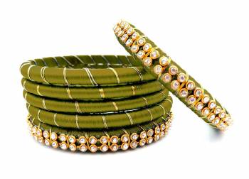 Grab This Beautiful Set Of Six Bangles To Simple Pair Up With Your Ethnic Wear Or You Can Also Mix It With Other Plain Bangles For More Heavy Look. It Is Made With Silk Thread And Beautified With Stone Work, Pair These Up With Same Or Any Contrasting Colored Ethnic Attire.