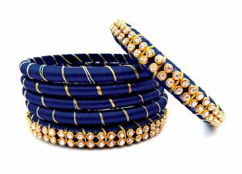 Grab This Beautiful Set Of Six Bangles To Simple Pair Up With Your Ethnic Wear Or You Can Also Mix It With Other Plain Bangles For More Heavy Look. It Is Made With Silk Thread And Beautified With Stone Work, Pair These Up With Same Or Any Contrasting Colored Ethnic Attire.