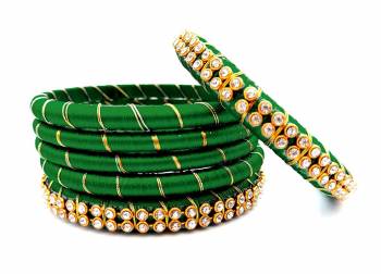 Grab This Beautiful Set Of Six Bangles To Simple Pair Up With Your Ethnic Wear Or You Can Also Mix It With Other Plain Bangles For More Heavy Look. It Is Made With Silk Thread And Beautified With Stone Work, Pair These Up With Same Or Any Contrasting Colored Ethnic Attire.