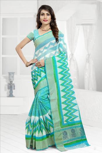 Grab This Beautiful Saree With Soft Color Pallete In Aqua Blue And White Color Paired With Aqua Blue And White Colored Blouse. This Saree And Blouse Are Cotton Based Beautified With Prints All Over It. 