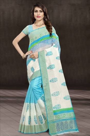 Grab This Beautiful Saree With Soft Color Pallete In Aqua Blue And White Color Paired With Aqua Blue And White Colored Blouse. This Saree And Blouse Are Cotton Based Beautified With Prints All Over It. 