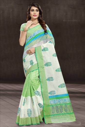 Simple And Elegant Looking Saree Is Here For Your Semi-Casual Wear Is Here In Green and White Color Paired With Green and White Colored Blouse. This Saree And Blouse Are Cotton Based Beautified With Prints All Over It. 