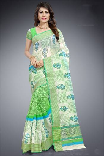 Simple And Elegant Looking Saree Is Here For Your Semi-Casual Wear Is Here In Green and White Color Paired With Green and White Colored Blouse. This Saree And Blouse Are Cotton Based Beautified With Prints All Over It. 