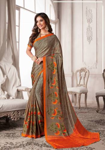 Flaunt Your Rich and Elegant Taste Wearing This Printed Saree In Beige Color Paired With Beige Colored Blouse. This Saree And Blouse Are Georgette Based Floral And Geometric Prints.