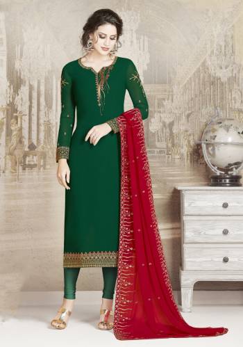 Celebrate This Festive Season Wearing This Designer Straight Suit In Dark Green Color Paired With Contrasting Red Colored Dupatta. Its Top And Dupatta Are Georgette Based Paired With Santoon Bottom. Buy This Semi-Stitched Suit Now.