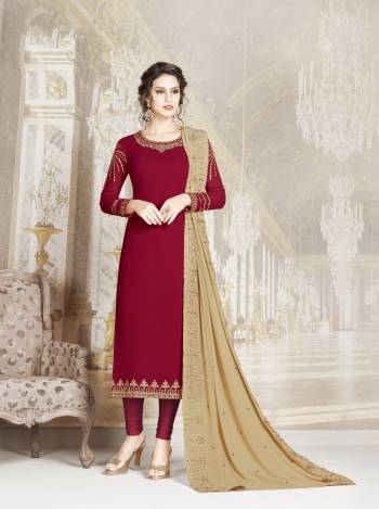 Royal And Elegant Looking Designer Straight Suit Is Here In Maroon Colored Top and Bottom Paired With Beige Dupatta. This Semi-Stitched Suit Is Georgette Based Beautified With Minimal And Elegant Looking Embroidery. 