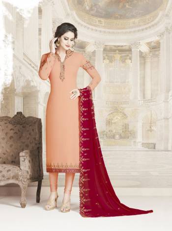 A Must Have Shade In Every Womens Wardrobe Is Here With This Designer Straight Suit In Peach Color Paired With Contrasting Red Colored Dupatta. This Lovely Suit Is Georgette Based Beautified With Attractive Embroidery Over Its Top And Dupatta.