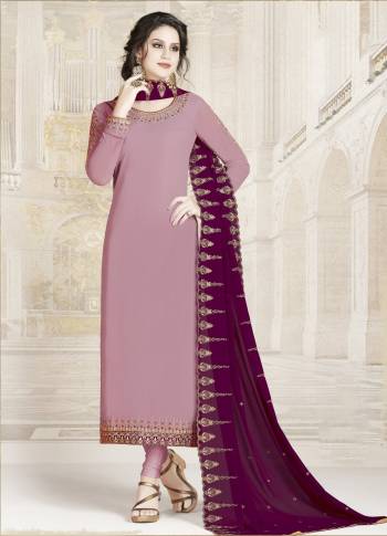 Add This New Shade In Purple To Your Wardrobe With This Designer Straight Suit In Mauve Color Paired With Contrasting Wine Colored Dupatta. Its Top And Dupatta Are Georgette Based Paired With Santoon Bottom. Buy This Now.