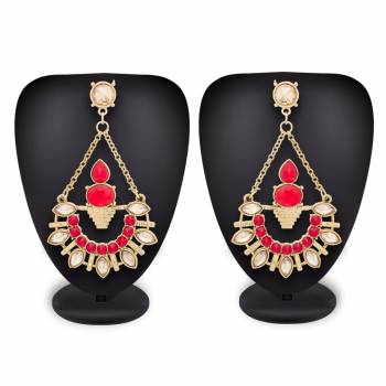 This Festive Season, Add A Glam Look To Your Ethnic Wear Pairing It With This Beauitful Pair Of Earrings In Golden Color Beautified With Red And White Stone Work. 