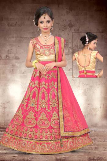 Make Your Girl Look The Prettiest Of All With This Heavy Designer Lehenga Choli In Golden Colored Blouse Paired With Pink Colored Lehenga And Dupatta. It Is Beautified With Heavy Jari Embroidery And Stone Work. Buy Now.