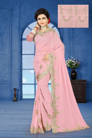 Look Very Pretty Wearing This Designer Saree In Light Pink Color Paired With Light Pink Colored Blouse. This Saree Is Fabricated On Sparkle Silk Paired With Net And Art Silk Fabricated Blouse. It Has Beautiful Attractive Embroidery Over The Lace Border And Blouse. 