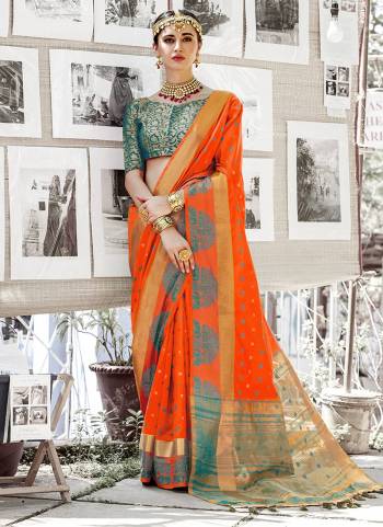 Give A Traditional Touch To Your Look With This Nylon Silk Based Saree In Orange Color Paired With Contrasting Turquoise Blue Colored Blouse. It Is Light Weight And Easy To Drape Which Is Easy To Carry All Day Long.