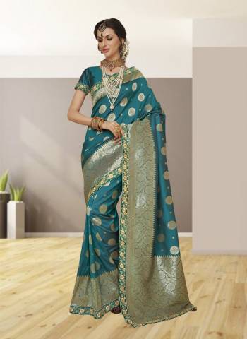 Look Beautiful Wearing This Turquoise Blue Colored Saree Paired With Turquoise Blue Colored Blouse. This Saree Is Fabricated On Jacquard Silk Paired With Satin Silk Fabricated Blouse. This Saree Is Light In Weight And Easy To Carry All Day Long. Buy Now.