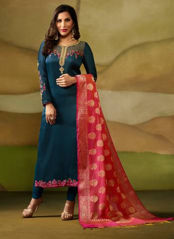 Get Ready For The Upcoming Festive and Wedding Season Wearing This Designer Straight Suit In Blue Color Paired With Blue Colored Bottom And Contrasting Dark Pink Colored Dupatta. Its Top Is Fabricated On Satin Georgette Paired With Santoon Bottom And Banarasi Silk Dupatta. Buy Now.